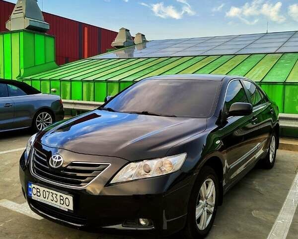 Черный Тойота Камри, объемом двигателя 2.36 л и пробегом 240 тыс. км за 11000 $, фото 1 на Automoto.ua