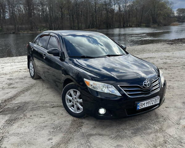 Черный Тойота Камри, объемом двигателя 2.4 л и пробегом 320 тыс. км за 9999 $, фото 1 на Automoto.ua