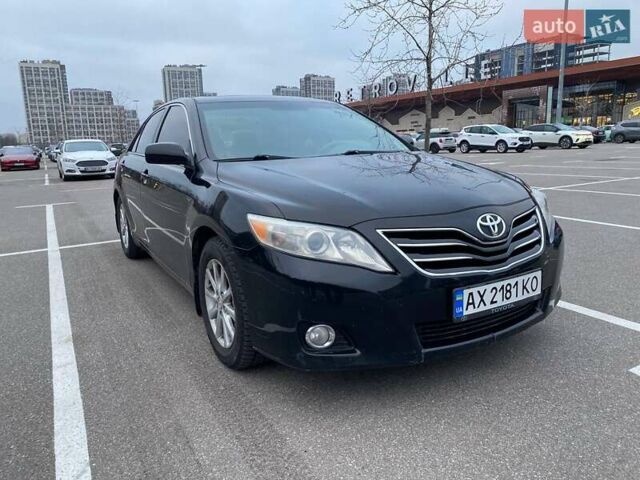Черный Тойота Камри, объемом двигателя 2.49 л и пробегом 280 тыс. км за 8650 $, фото 1 на Automoto.ua