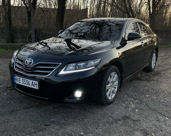 Черный Тойота Камри, объемом двигателя 2.4 л и пробегом 366 тыс. км за 6500 $, фото 1 на Automoto.ua