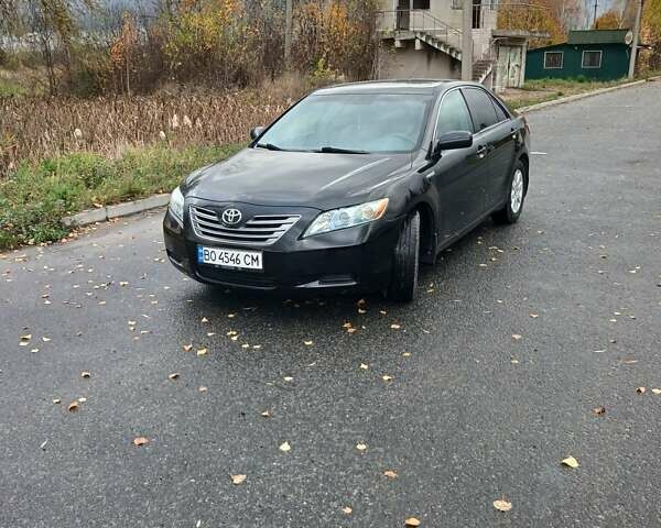 Черный Тойота Камри, объемом двигателя 2.36 л и пробегом 268 тыс. км за 9500 $, фото 1 на Automoto.ua