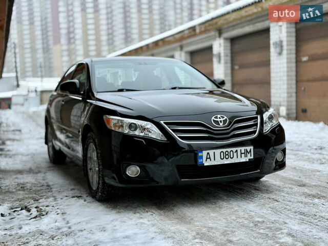Чорний Тойота Камрі, об'ємом двигуна 2.4 л та пробігом 195 тис. км за 9900 $, фото 1 на Automoto.ua
