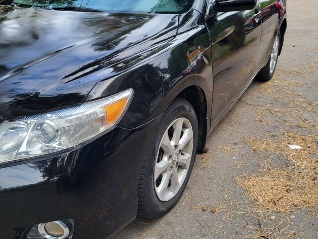 Черный Тойота Камри, объемом двигателя 2.5 л и пробегом 230 тыс. км за 7000 $, фото 1 на Automoto.ua