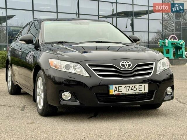 Черный Тойота Камри, объемом двигателя 2.4 л и пробегом 13 тыс. км за 22000 $, фото 1 на Automoto.ua