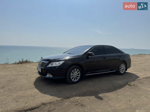 Черный Тойота Камри, объемом двигателя 2.49 л и пробегом 210 тыс. км за 13500 $, фото 1 на Automoto.ua