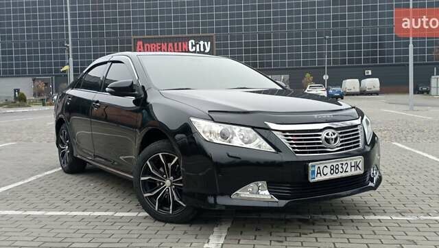 Черный Тойота Камри, объемом двигателя 2.5 л и пробегом 187 тыс. км за 11000 $, фото 1 на Automoto.ua