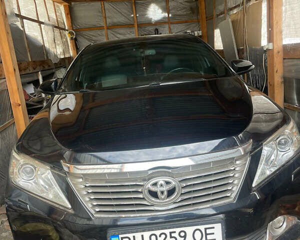 Чорний Тойота Камрі, об'ємом двигуна 2.5 л та пробігом 195 тис. км за 10000 $, фото 1 на Automoto.ua