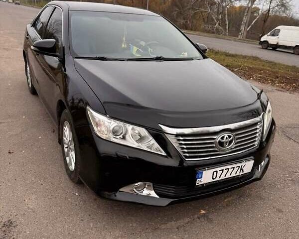 Чорний Тойота Камрі, об'ємом двигуна 2.49 л та пробігом 236 тис. км за 11000 $, фото 1 на Automoto.ua