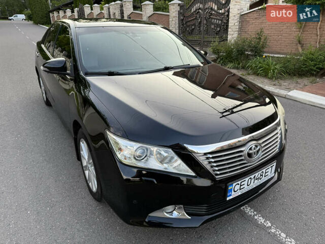 Чорний Тойота Камрі, об'ємом двигуна 3.46 л та пробігом 210 тис. км за 13500 $, фото 1 на Automoto.ua