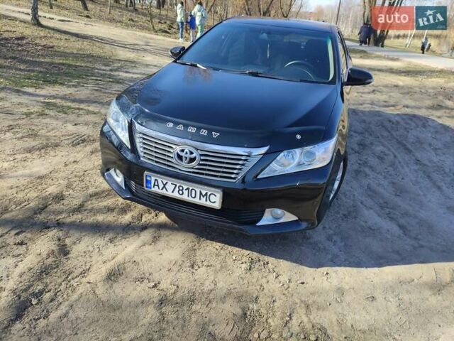 Черный Тойота Камри, объемом двигателя 2.5 л и пробегом 294 тыс. км за 12000 $, фото 1 на Automoto.ua