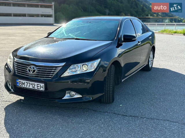 Чорний Тойота Камрі, об'ємом двигуна 2.49 л та пробігом 257 тис. км за 14000 $, фото 1 на Automoto.ua