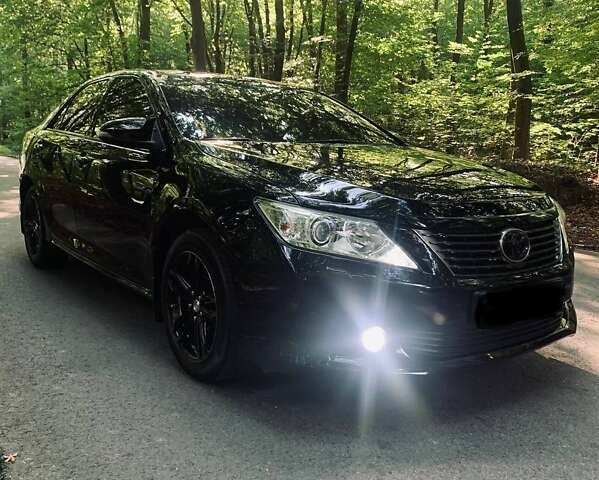 Черный Тойота Камри, объемом двигателя 2.5 л и пробегом 250 тыс. км за 13000 $, фото 1 на Automoto.ua