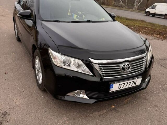 Черный Тойота Камри, объемом двигателя 2.5 л и пробегом 233 тыс. км за 11000 $, фото 1 на Automoto.ua