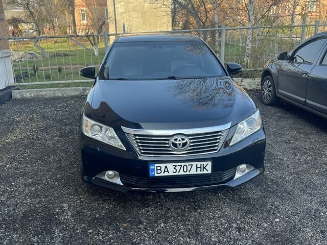 Чорний Тойота Камрі, об'ємом двигуна 2.5 л та пробігом 190 тис. км за 14000 $, фото 1 на Automoto.ua