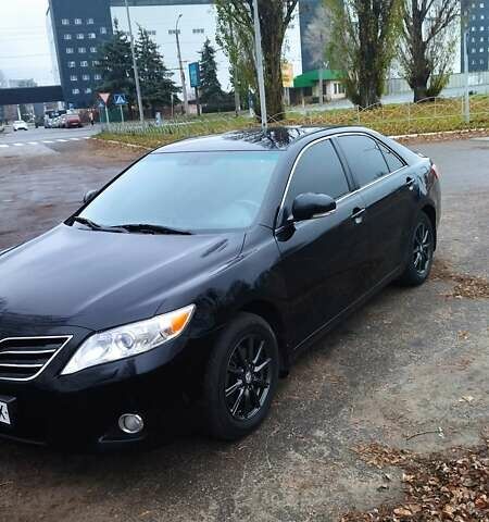 Черный Тойота Камри, объемом двигателя 2.36 л и пробегом 248 тыс. км за 10500 $, фото 1 на Automoto.ua