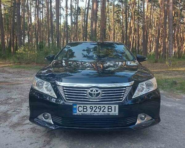 Черный Тойота Камри, объемом двигателя 2.5 л и пробегом 260 тыс. км за 13600 $, фото 1 на Automoto.ua