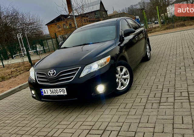 Черный Тойота Камри, объемом двигателя 2.4 л и пробегом 315 тыс. км за 9799 $, фото 1 на Automoto.ua