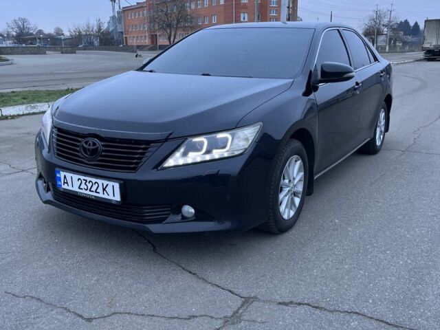 Черный Тойота Камри, объемом двигателя 2.5 л и пробегом 203 тыс. км за 12500 $, фото 1 на Automoto.ua