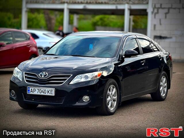 Чорний Тойота Камрі, об'ємом двигуна 2.4 л та пробігом 220 тис. км за 9900 $, фото 1 на Automoto.ua