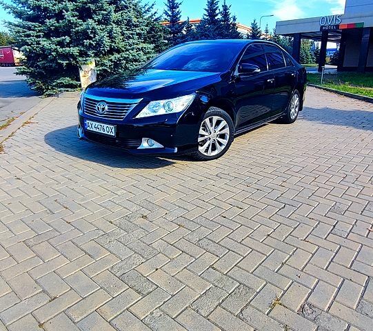 Чорний Тойота Камрі, об'ємом двигуна 2.5 л та пробігом 180 тис. км за 13100 $, фото 1 на Automoto.ua