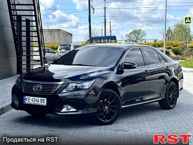 Черный Тойота Камри, объемом двигателя 2.5 л и пробегом 186 тыс. км за 13500 $, фото 1 на Automoto.ua