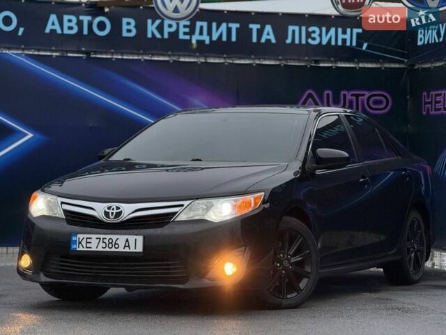 Черный Тойота Камри, объемом двигателя 3.46 л и пробегом 184 тыс. км за 11499 $, фото 1 на Automoto.ua