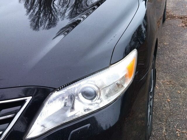 Черный Тойота Камри, объемом двигателя 2.4 л и пробегом 248 тыс. км за 10500 $, фото 1 на Automoto.ua