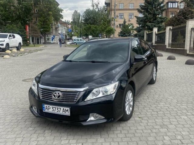 Черный Тойота Камри, объемом двигателя 2.5 л и пробегом 220 тыс. км за 11800 $, фото 1 на Automoto.ua