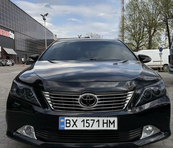 Черный Тойота Камри, объемом двигателя 2.5 л и пробегом 265 тыс. км за 10917 $, фото 1 на Automoto.ua