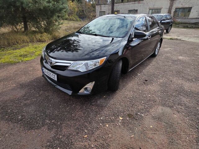 Чорний Тойота Камрі, об'ємом двигуна 2.5 л та пробігом 230 тис. км за 9999 $, фото 1 на Automoto.ua