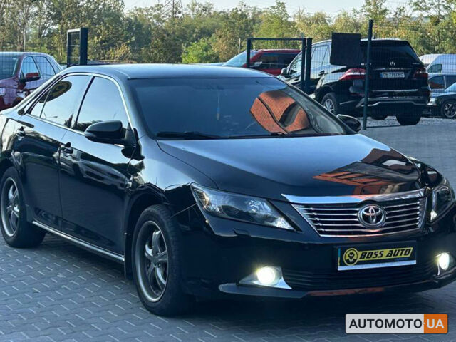 Черный Тойота Камри, объемом двигателя 2.5 л и пробегом 211 тыс. км за 12700 $, фото 1 на Automoto.ua