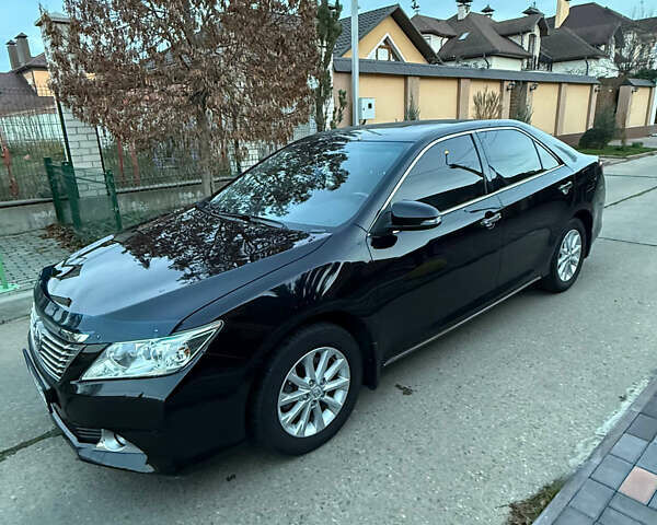 Черный Тойота Камри, объемом двигателя 2.5 л и пробегом 173 тыс. км за 13350 $, фото 1 на Automoto.ua