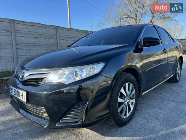 Чорний Тойота Камрі, об'ємом двигуна 2.5 л та пробігом 155 тис. км за 12000 $, фото 1 на Automoto.ua