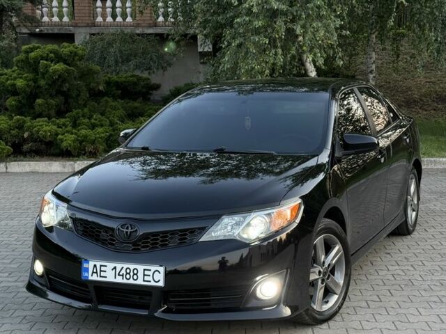 Черный Тойота Камри, объемом двигателя 2.5 л и пробегом 198 тыс. км за 10900 $, фото 1 на Automoto.ua