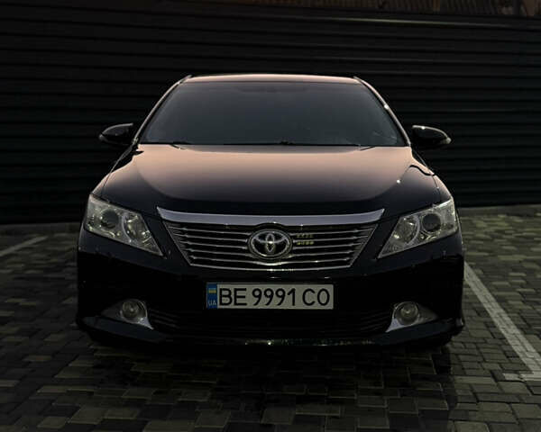 Чорний Тойота Камрі, об'ємом двигуна 2.5 л та пробігом 216 тис. км за 13000 $, фото 1 на Automoto.ua