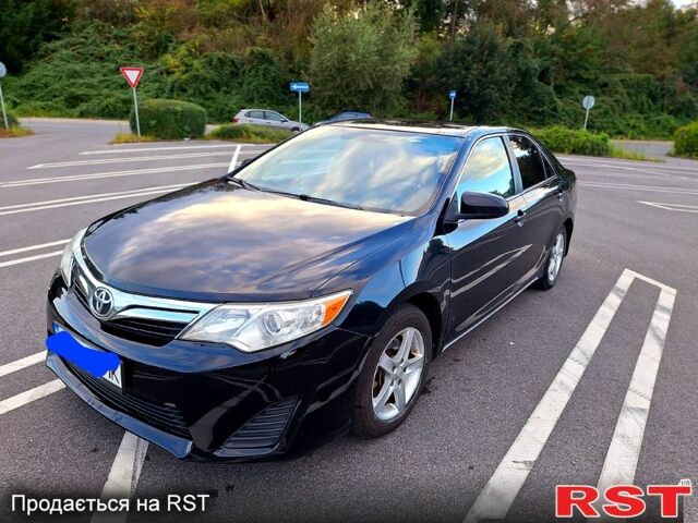 Чорний Тойота Камрі, об'ємом двигуна 2.5 л та пробігом 280 тис. км за 11000 $, фото 1 на Automoto.ua