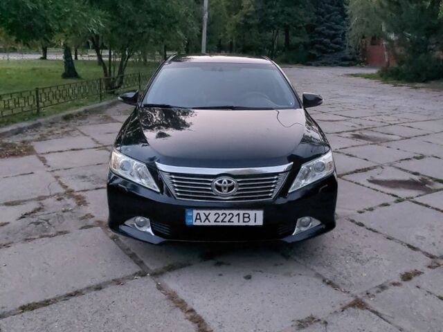 Чорний Тойота Камрі, об'ємом двигуна 2.5 л та пробігом 242 тис. км за 13000 $, фото 1 на Automoto.ua