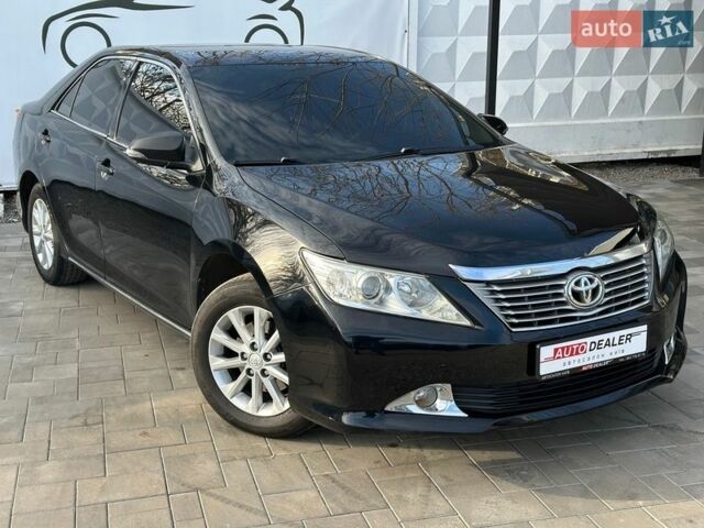 Чорний Тойота Камрі, об'ємом двигуна 2.5 л та пробігом 233 тис. км за 11500 $, фото 1 на Automoto.ua