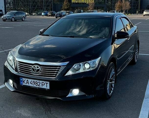 Черный Тойота Камри, объемом двигателя 2.49 л и пробегом 271 тыс. км за 15100 $, фото 1 на Automoto.ua
