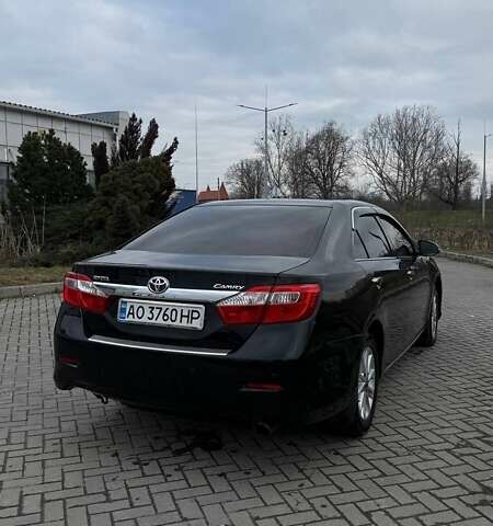 Черный Тойота Камри, объемом двигателя 2.5 л и пробегом 239 тыс. км за 12600 $, фото 1 на Automoto.ua