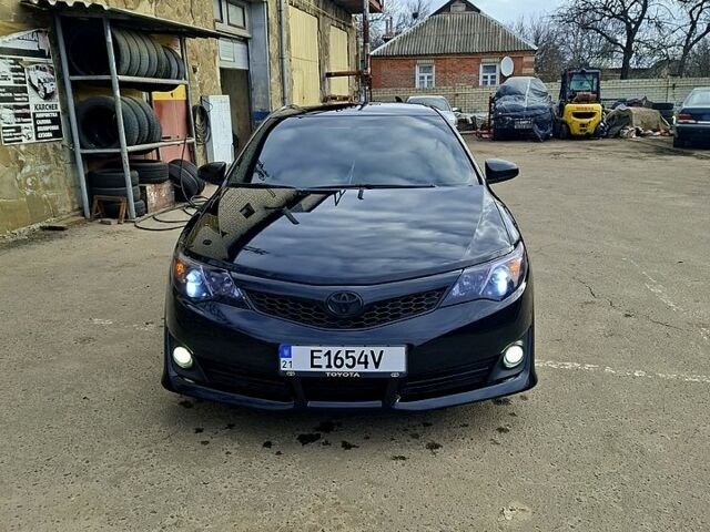 Черный Тойота Камри, объемом двигателя 2.5 л и пробегом 257 тыс. км за 12000 $, фото 1 на Automoto.ua