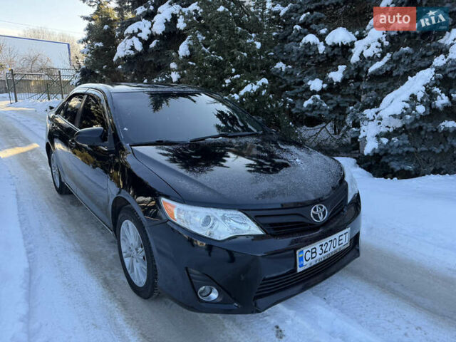 Чорний Тойота Камрі, об'ємом двигуна 2.5 л та пробігом 240 тис. км за 9800 $, фото 1 на Automoto.ua