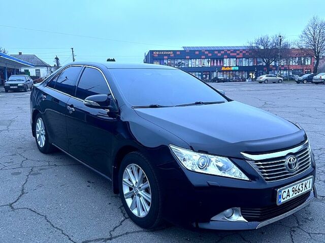 Чорний Тойота Камрі, об'ємом двигуна 2.5 л та пробігом 170 тис. км за 15300 $, фото 1 на Automoto.ua