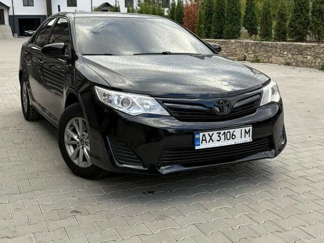 Чорний Тойота Камрі, об'ємом двигуна 2.5 л та пробігом 210 тис. км за 11550 $, фото 1 на Automoto.ua