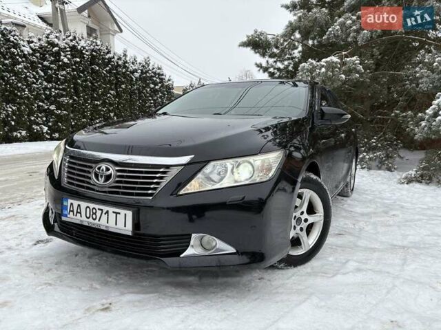 Черный Тойота Камри, объемом двигателя 2.49 л и пробегом 190 тыс. км за 12400 $, фото 1 на Automoto.ua
