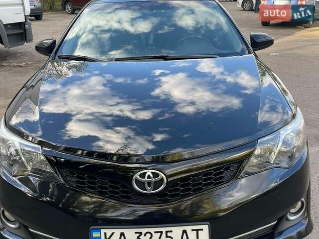 Черный Тойота Камри, объемом двигателя 2.5 л и пробегом 309 тыс. км за 12100 $, фото 1 на Automoto.ua