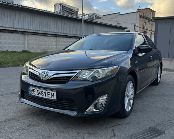 Черный Тойота Камри, объемом двигателя 2.5 л и пробегом 185 тыс. км за 12800 $, фото 1 на Automoto.ua