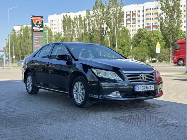 Черный Тойота Камри, объемом двигателя 2.5 л и пробегом 140 тыс. км за 10500 $, фото 1 на Automoto.ua