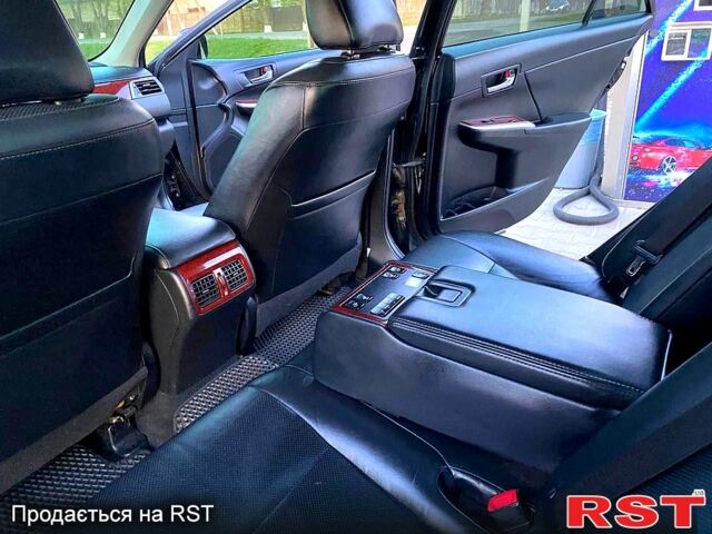 Черный Тойота Камри, объемом двигателя 2.5 л и пробегом 236 тыс. км за 14500 $, фото 1 на Automoto.ua