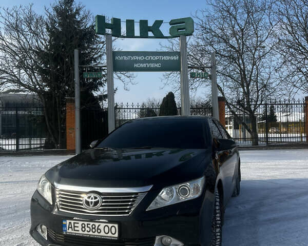 Черный Тойота Камри, объемом двигателя 2.49 л и пробегом 230 тыс. км за 15000 $, фото 1 на Automoto.ua
